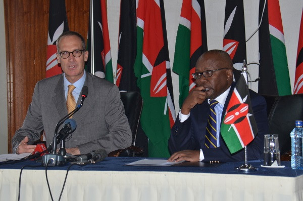 Kenyan and Swiss representatives sign an MOU