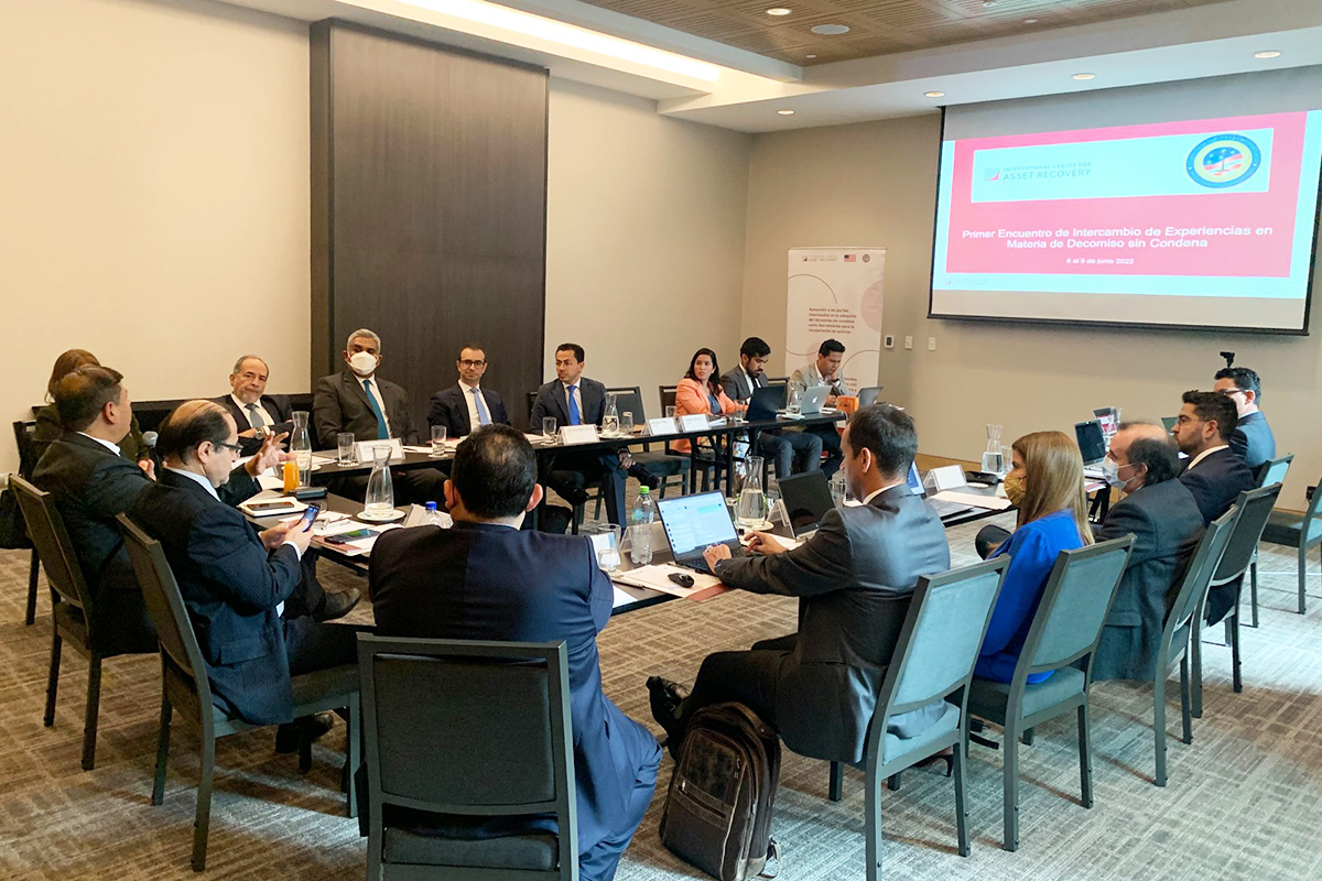 Regional meeting on NCBF laws with participants around a U-shaped table