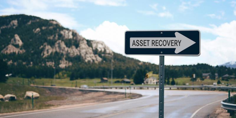 Asset recovery road sign